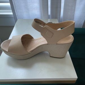 Cream clogs! Made for walking on vacation.